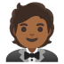 🤵🏾 person in tuxedo: medium-dark skin tone display on Google